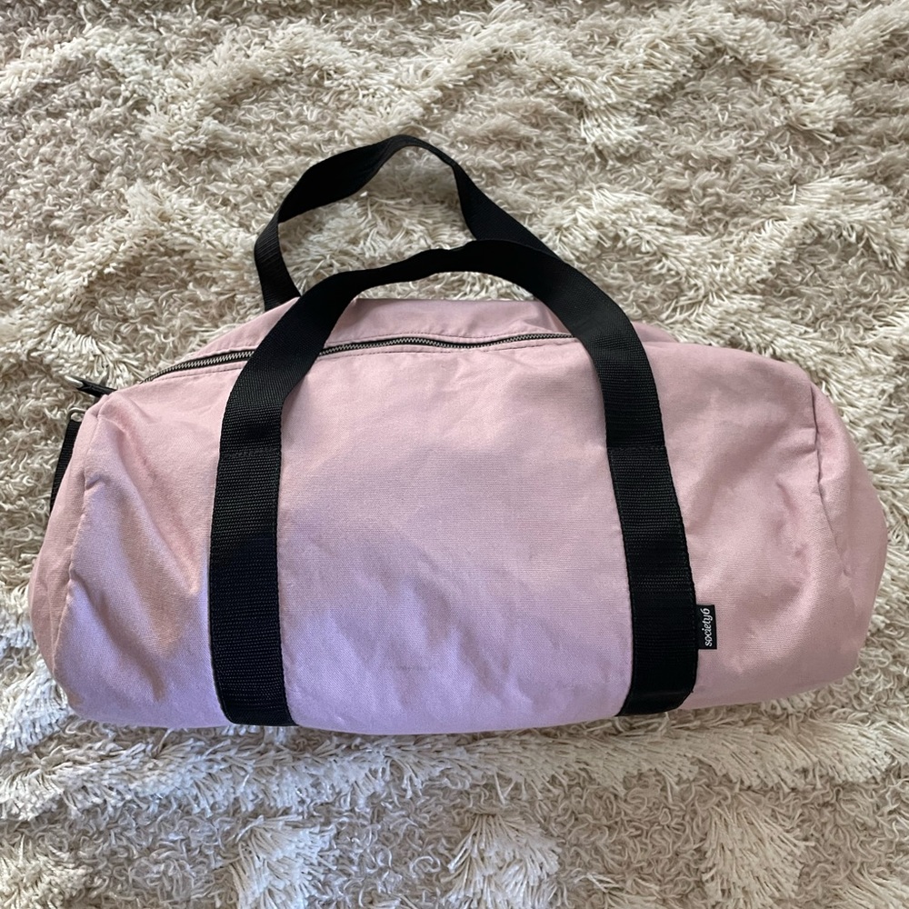 Society6 pink and black duffel bag